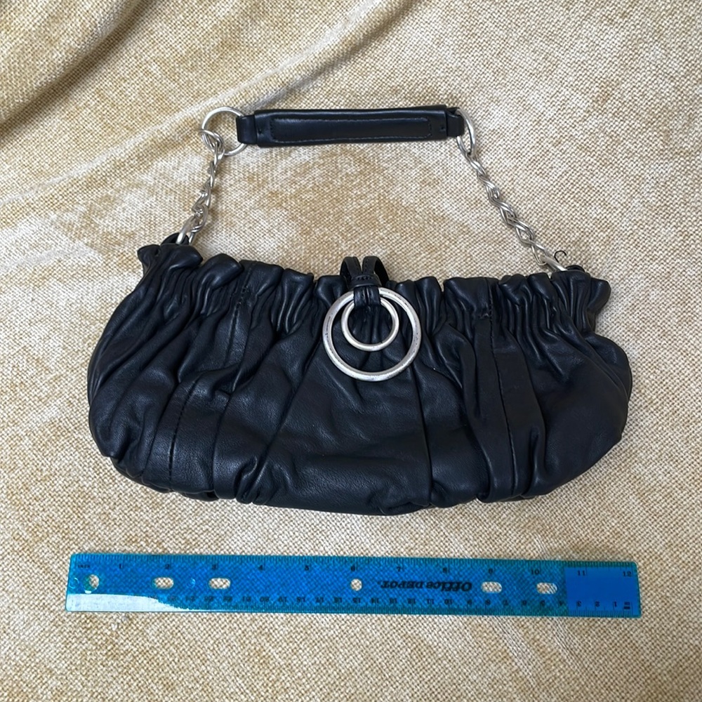 White Black leather clutch purse. New.